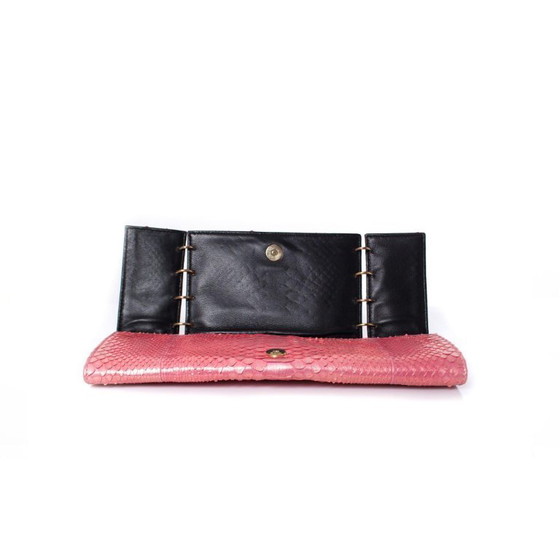 Image 1 of Maison du Posh, Pochette con teschio perforato in pitone rosa