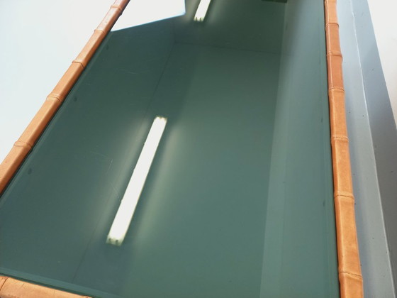 Image 1 of Vintage Swiss rectangular coffee table by De Sede in smoked glass and leather from the 1970s