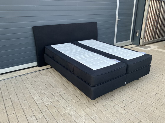Image 1 of Auping Boxspring 160x200 nero con materassi Auping Cresto in ottime condizioni!