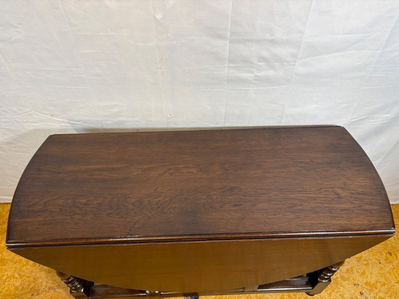 Image 1 of Jacobean Revival massief eiken klaptafel met neerklapbaar blad (circa 1900)