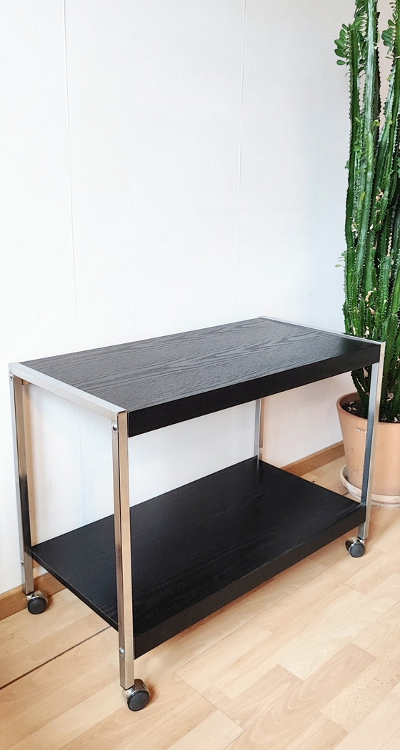 Image 1 of Mesa de centro cromada con ruedas