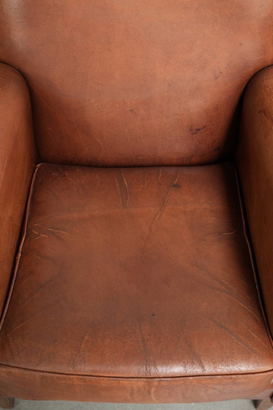 Stoere Vintage Schapenleren Armchair Met Een Mooie Cognac Kleur En Een Comfortabele Zit – Fauteuils, Leather (photo 6 of 13)