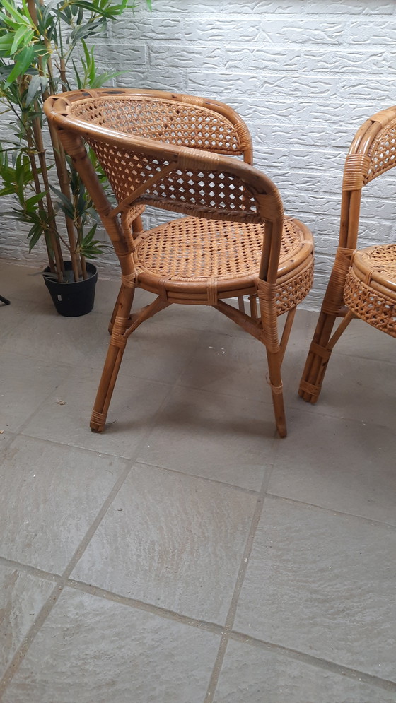Image 1 of Set di 2 poltrone vintage in rattan con seduta e schienale intrecciati.