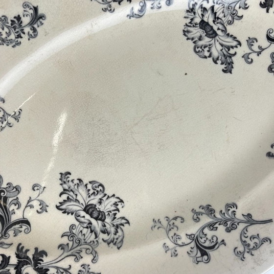 Image 1 of Grand plat ovale terre de fer, modele "Damas" par Sarreguemines, fin XIXe, gris-noir