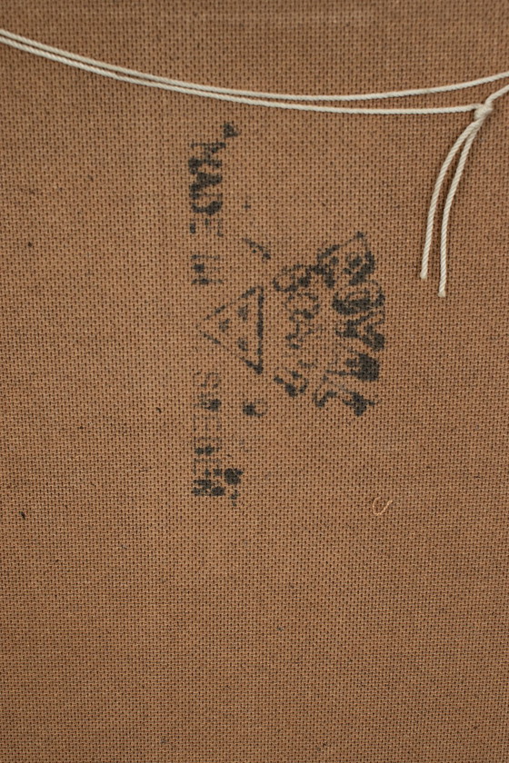 Image 1 of Aksel Kjersgaard in front of Odder Møbler mirror