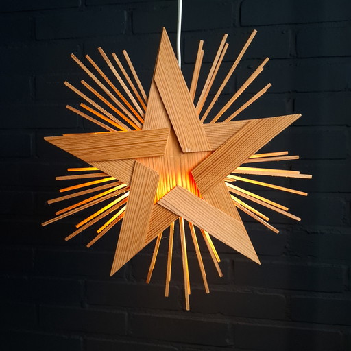 Vintage wooden Christmas star Advent star with lighting