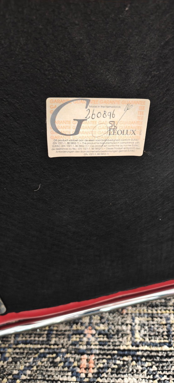 Image 1 of Leolux dining table with 8 matching leather Leolux chairs