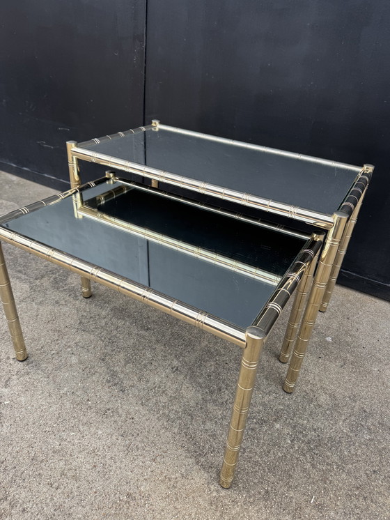 Image 1 of Nesting tables in gold-tone metal, bamboo, and mirror, 1970s style