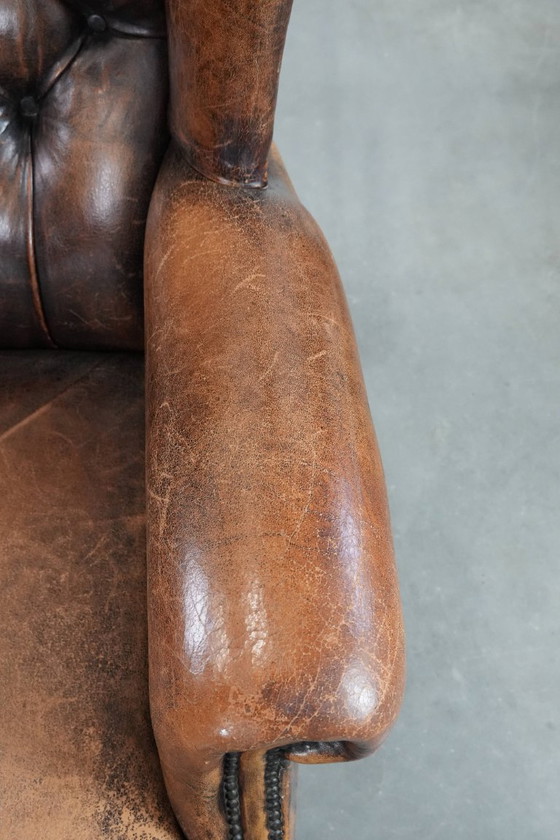 Image 1 of Unique large English-style sheepskin Chesterfield wing armchair