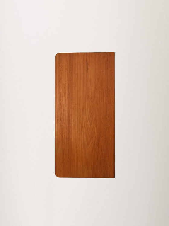 Image 1 of Scandinavian teak chest of drawers with black legs