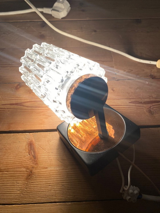 Image 1 of Een paar vintage koperen wandlampen van Phillips uit de jaren 70.