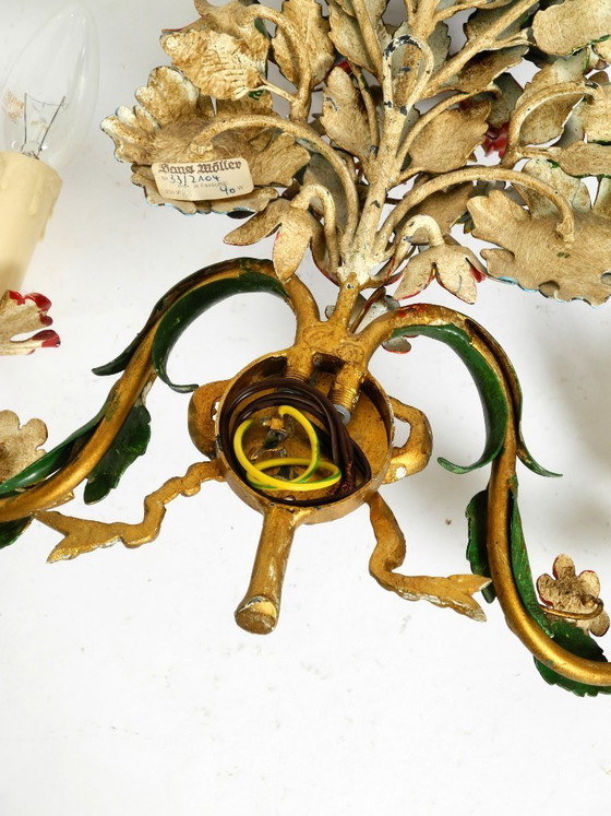 Image 1 of Une paire de magnifiques appliques murales en métal doré et peint à la main, datant des années 1960, signées Hans Möller.