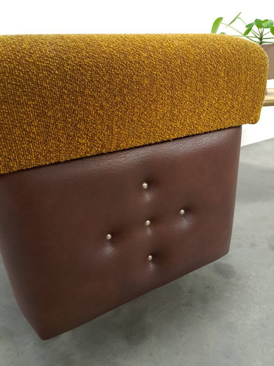 Image 1 of Ottoman with lid on chrome wheels