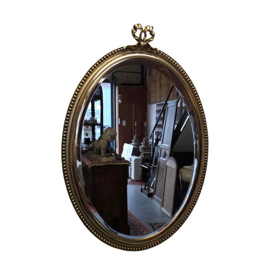 Image 1 of French style brass mirror with bow