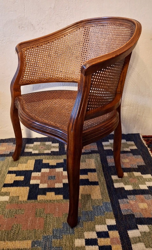 Sillón de media luna de ratán y madera noble, estilo Luis XV, principios del siglo XX