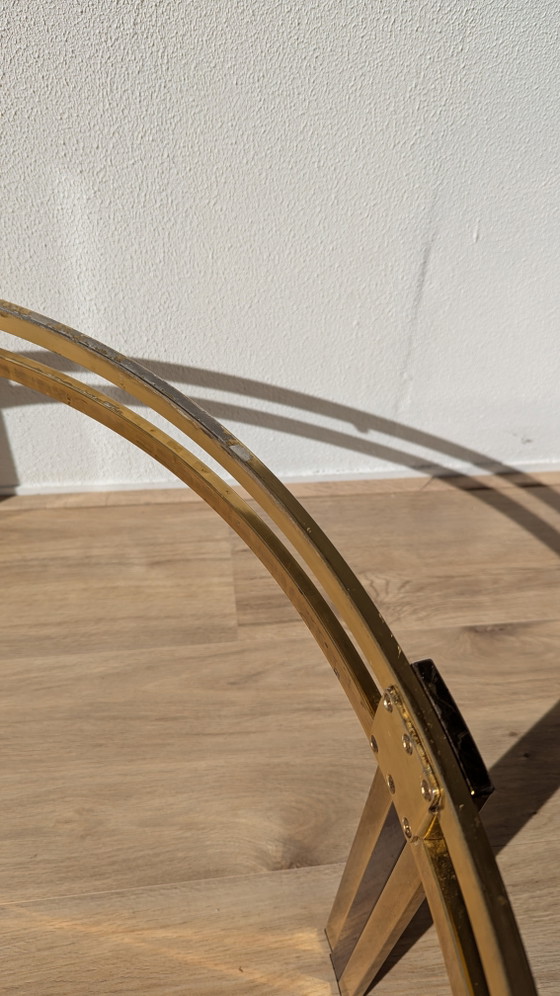 Image 1 of Hollywood Regency salontafel van zwart messing en gerookt glas