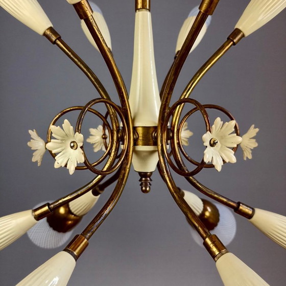 Image 1 of Chandelier twelve-light with Murano glass "Reticello" lampshades. Gilt brass and aluminum frame. Italy, 1950s.