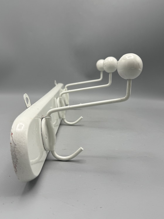 Image 1 of Mid - Century coat rack sleek and timeless design