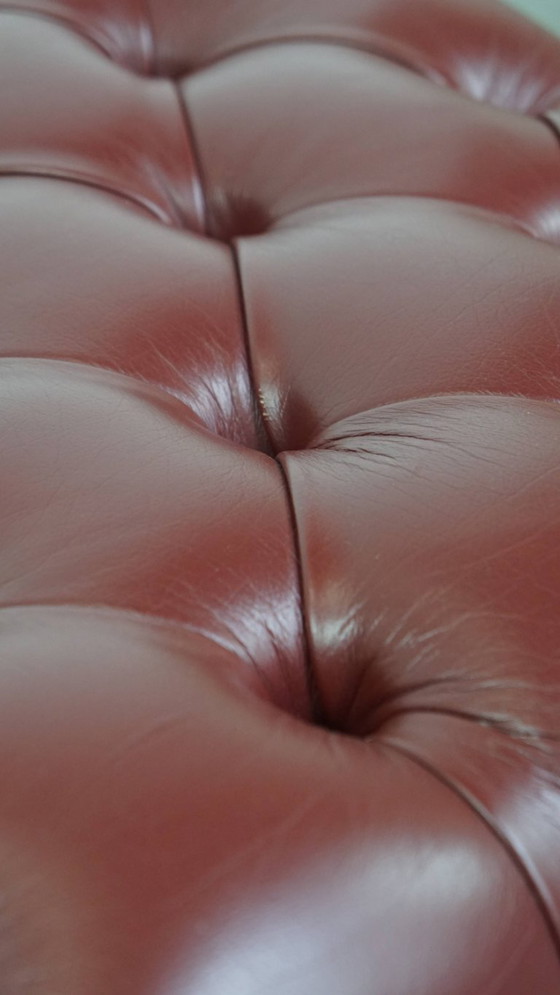 Image 1 of Elegant red/brown Chesterfield stool in very good condition