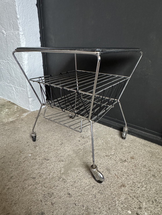 Image 1 of 1950s rolling newspaper rack