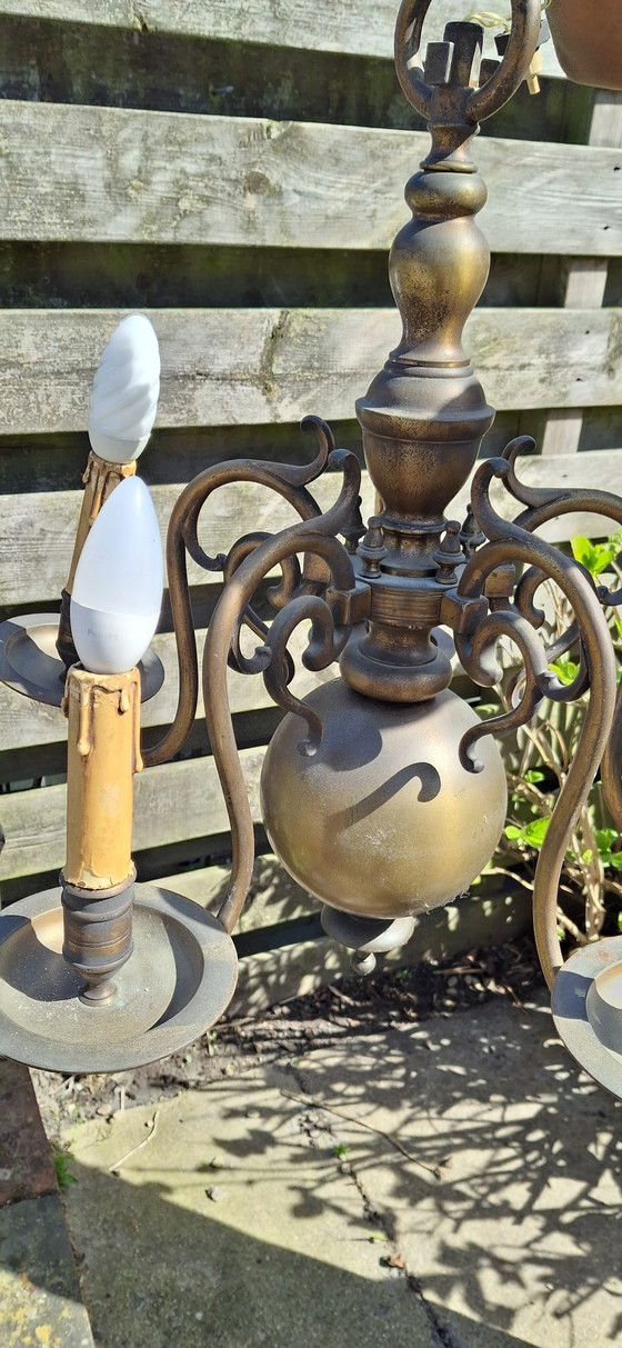 Image 1 of Pesante corona antica in bronzo.