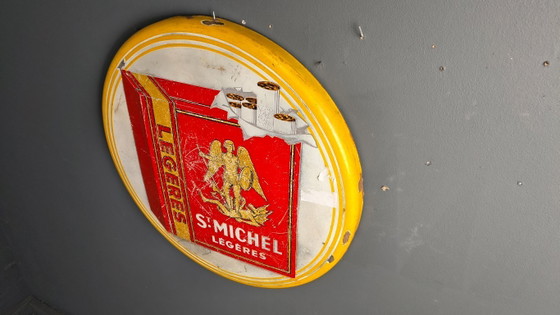 Image 1 of Enamel sign St Michel Cigarettes, 1953 