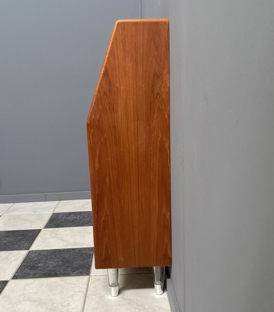 Image 1 of Teak tall sideboard on lucite legs 1960s
