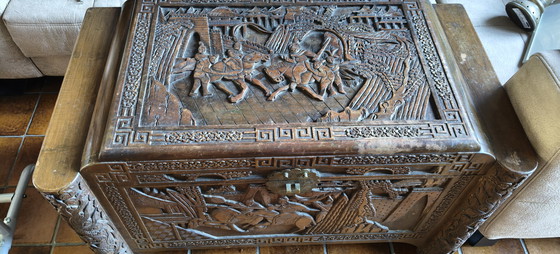 Image 1 of Antique Chinese chest with deep wood carving