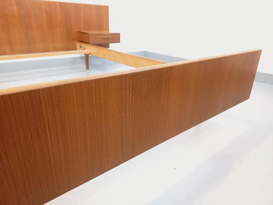 Image 1 of Vintage Scandinavian teak double bed from the 1960s with integrated bedside tables