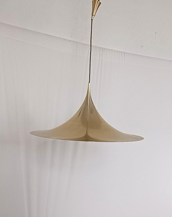 Image 1 of Fog & Morup witch hat lamp in gold color from 1968