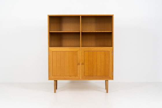 Image 1 of Eikenhouten boekenkast van Rud Thygesen & Johnny Sørensen voor HG meubelen (Denemarken, jaren 60).