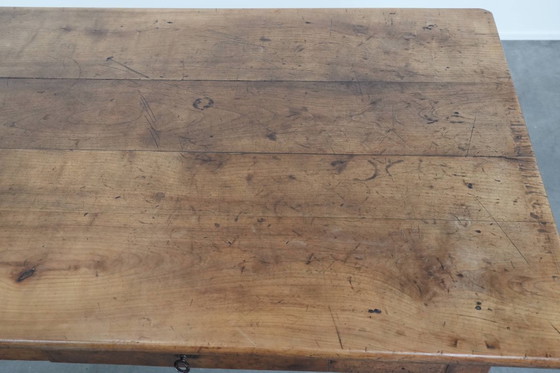 Image 1 of Early 19th century French fruitwood dining table with two drawers