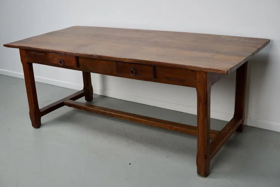 Image 1 of Early 20th-century French rustic country dining table made of oak and elm