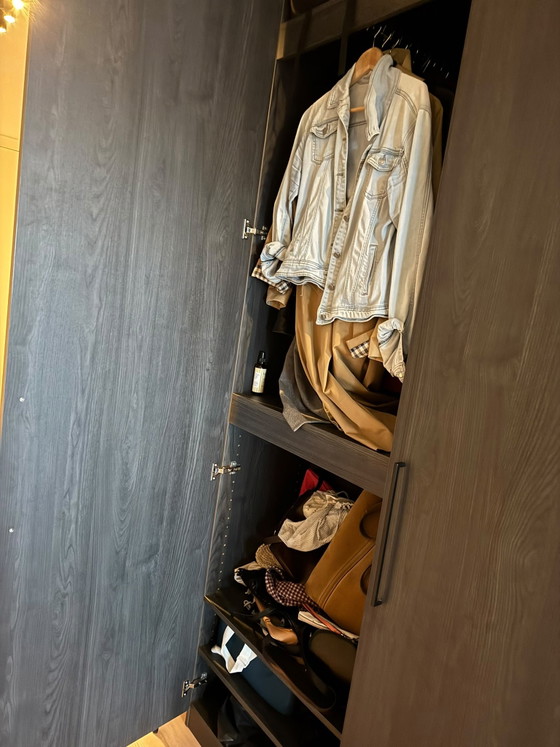 Image 1 of Custom-made wardrobe / clothes cupboard in brown/black wood. 260 high