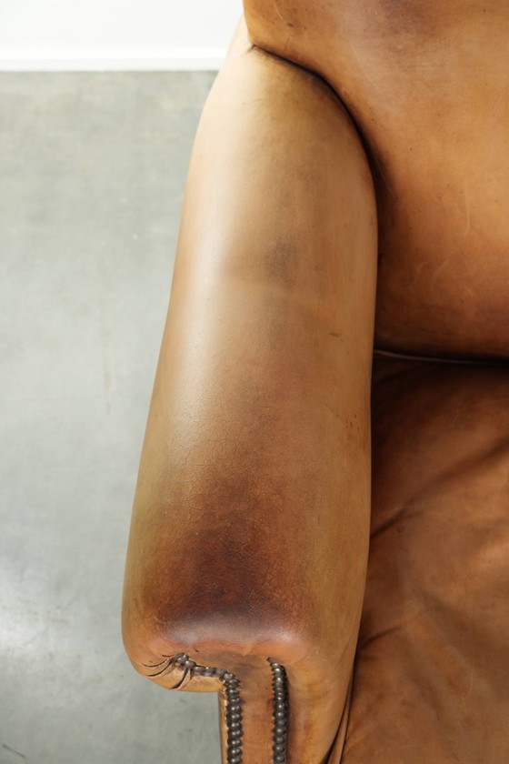 Image 1 of Beautiful and comfortable armchair made of cowhide leather with a characterful and charming English look.