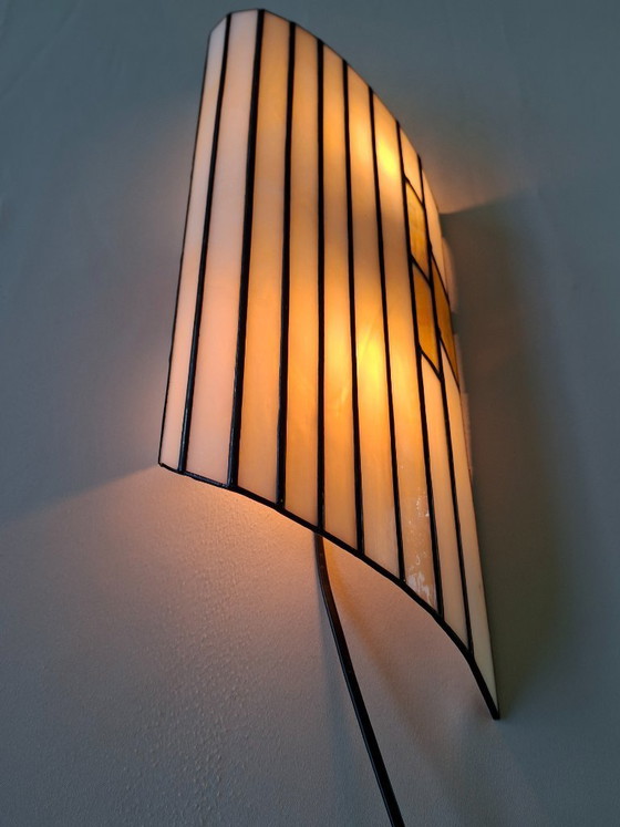 Image 1 of Tiffany  wandlamp met gekleurd glas in zwart koperband  Art Deco
