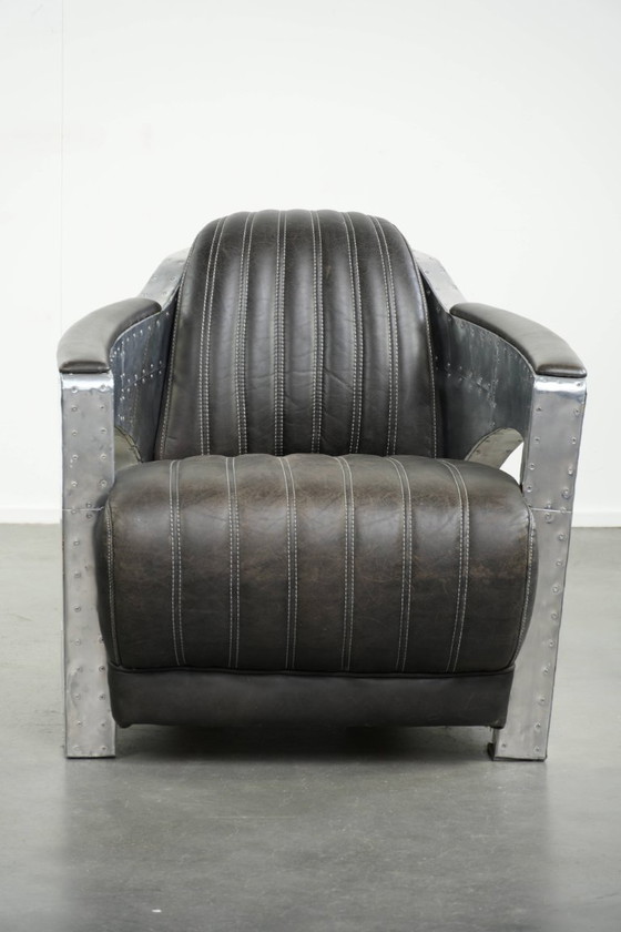 Image 1 of Fauteuil/robinet de style aviateur unique et confortable en cuir de vachette, finitions aluminium et rivets