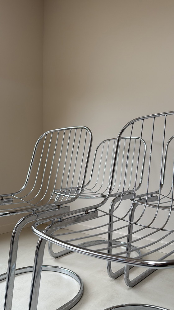 Image 1 of Vier Gastone Rinaldi stoelen verchroomd staal