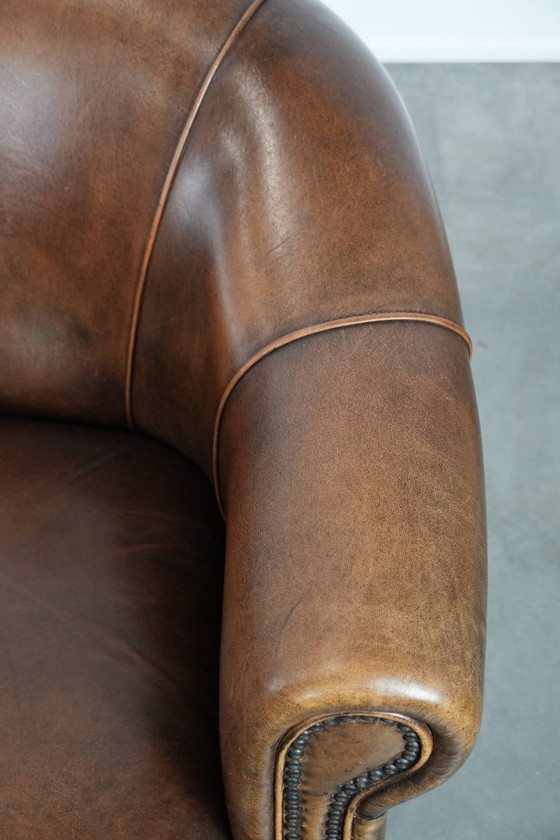 Image 1 of Vintage stoere 2-zits clubbank gemaakt van schapenleer