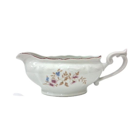 Image 1 of Saucière élégante en porcelaine à décor floral