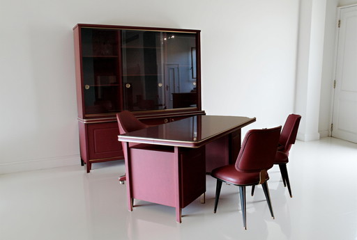 Umberto Mascagni study set, desk with three chairs and bookcase, in burgundy imitation leather and brass, 1950 Italy