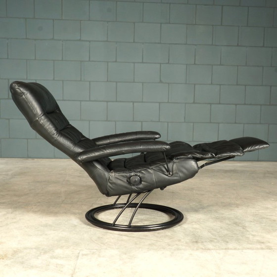 Image 1 of Vintage swivel armchair with footrest – recliner – 1980s