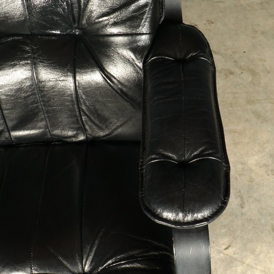 Image 1 of Vintage Unico draaifauteuil met hocker – jaren 70