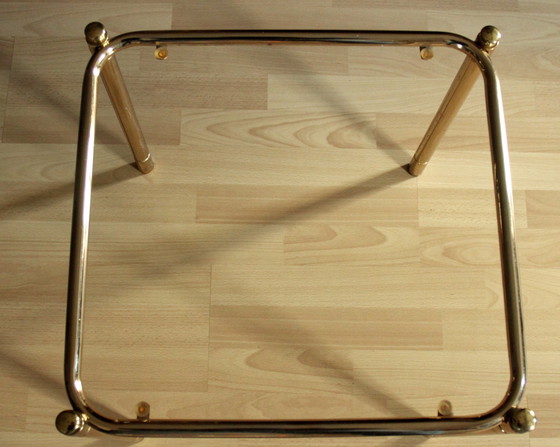 Image 1 of Space Age side table brass with smoked glass top - Vintage