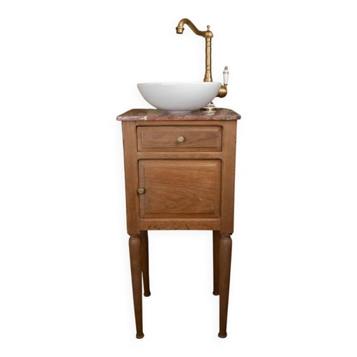 Petit lavabo ancien en bois et marbre rouge.