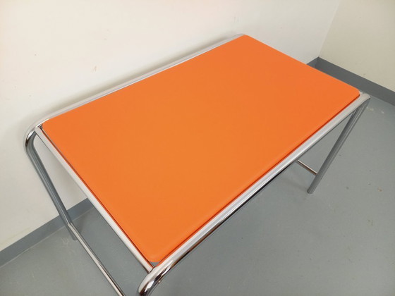 Image 1 of Vintage desk in orange imitation leather and chrome from the 1970s