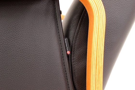 Image 1 of as new, Danish Nordic Easy Lounge Chair / Relax Armchair with stool in oak and leather.