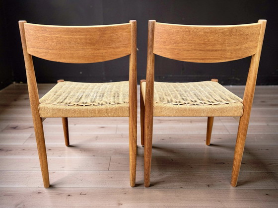 Image 1 of Een paar Deense eetkamerstoelen van Poul Volther voor Frem Rojle. Midden 20e eeuw.