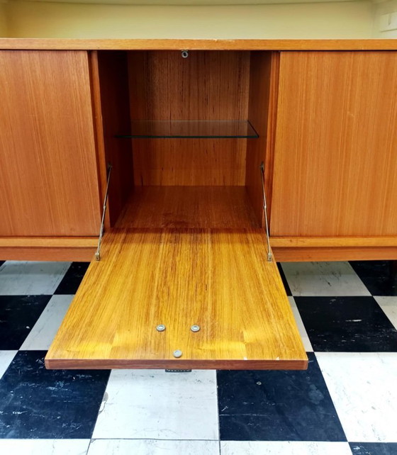 Image 1 of Teakhouten en leren dressoir van Malora, 1955