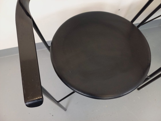 Image 1 of Set di 4 poltrone vintage di design italiano in metallo nero e similpelle nera degli anni '80